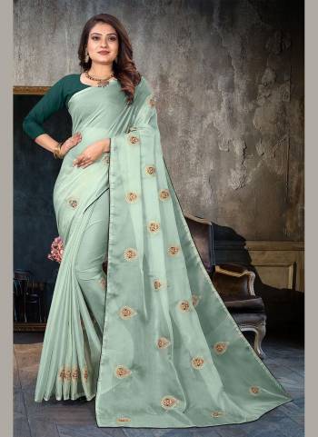 Add This Pretty Attractive Saree To Your Wardrobe.These Saree is Fabricated On Organza Pair With Dupion Silk Blouse.Its Beautified With Designer Resham Embroidery Work.