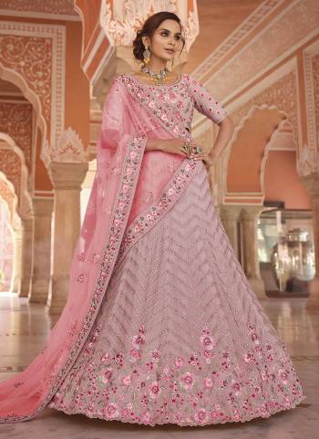 Flaunt Your Rich And Elegant Look Wearing This Designer?Lehenga Choli in All Over Beautiful Colored.These Lehenga And Blouse Are Fabricated On Georgette Pair With Soft Net Blouse.Its Beautified With Heavy Designer Work.