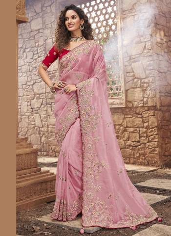 For A Bold And Beautiful Look, Grab This Designer Saree in Pretty Colored.These Saree And Blouse Are Fabricated On Organza?Based.Its Beautified With Heavy Designer Work.