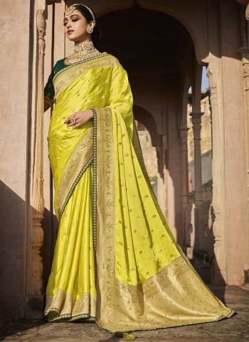 Enhance Your Personality Wearing This Designer Saree in All Over Lovely Colored.These Saree And Blouse Are Fabricated On Satin Silk Based.Its Beautified With Wevon Designer And Embroidery Work.