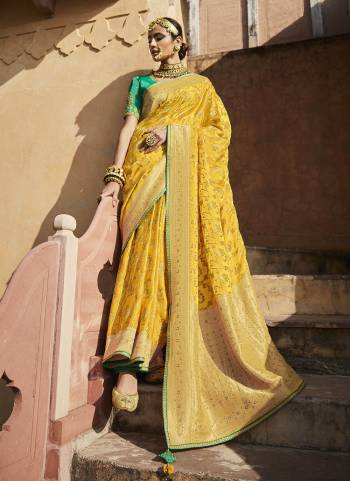 Enhance Your Personality Wearing This Designer Saree in All Over Lovely Colored.These Saree And Blouse Are Fabricated On Satin Silk Based.Its Beautified With Wevon Designer And Embroidery Work.