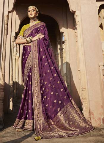 Enhance Your Personality Wearing This Designer Saree in All Over Lovely Colored.These Saree And Blouse Are Fabricated On Satin Silk Based.Its Beautified With Wevon Designer And Embroidery Work.