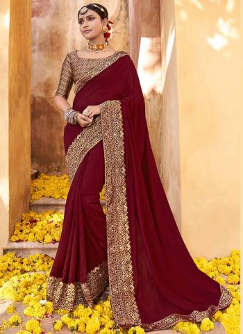 Look Beautiful In This Pretty Colored Saree Pair With Blouse.These Saree is Fabricated On Vichitra Silk Pair With Brocade Blouse.Its Beautified With Jacquard Wevon Designer Work.