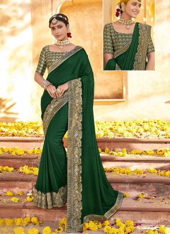 Look Beautiful In This Pretty Colored Saree Pair With Blouse.These Saree is Fabricated On Vichitra Silk Pair With Brocade Blouse.Its Beautified With Jacquard Wevon Designer Work.