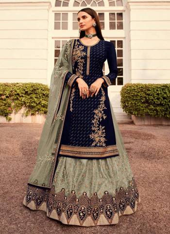 Celebrate This Festive Season Wearing This Suit In All Over Fine Colored.These Top is Fabricated On Faux Georgette Pair With Faux Georgette Bottom And Net Dupatta.Its Beautified With Heavy Designer Embroidery Work.