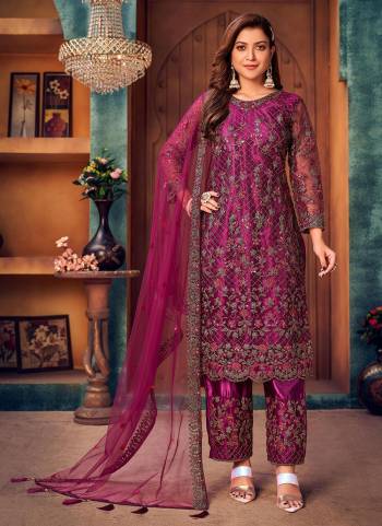 Earn Lots Of Compliments Wearing This Suit In Beautiful Colored.These Suit is Fabricated On Net Pair With Satin Bottom And Net Dupatta.Its Beautified With Heavy Designer Embroidery Work.