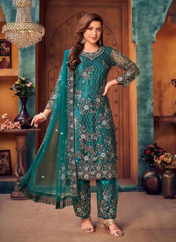 Earn Lots Of Compliments Wearing This Suit In Beautiful Colored.These Suit is Fabricated On Net Pair With Satin Bottom And Net Dupatta.Its Beautified With Heavy Designer Embroidery Work.