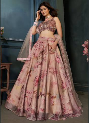 Earn Lots Of Compliments Wearing This Lehenga Choli in Pretty Colored.These Lehenga And Dupatta Are Fabricated On Chinon Based Pair With Silk Blouse.its Beautified With Heavy Designer Work.