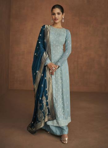 Grab This Lovely Plazzo Suit in Pretty Colored.These Top And Bottom Are Fabricated On Georgette Pair With Banarasi Jacquard Dupatta.Its Beautified With Heavy Embroidery Work.