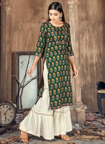 Grab These Readymade Collection in Beautiful Colored.These Top is Fabricated On Rayon Pair With Rayon Bottom.Its Beautified With Designer Printed Work.Its Available In All Regular Size.