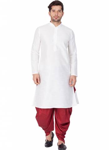 Take your ethnic style quotient to the next level by wearing this fashionable kurta set.Its Come With Banglori Silk Fabricated Kurta And Bottom.Its Beautified With Dyed Solid Work.