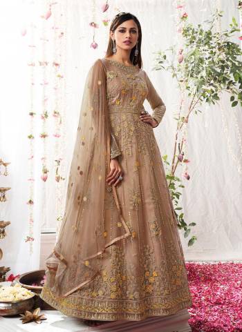 Grab These Semi Stiched Suit in Pretty Colored Pair With Bottom And Dupatta.These Top And Dupatta Are Fabricated On Butterfly Net Pair With Satin Bottom.Its Beautified With Heavy Designer Embroidery Work.