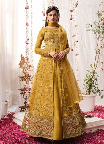 Grab These Semi Stiched Suit in Pretty Colored Pair With Bottom And Dupatta.These Top And Dupatta Are Fabricated On Butterfly Net Pair With Satin Bottom.Its Beautified With Heavy Designer Embroidery Work.