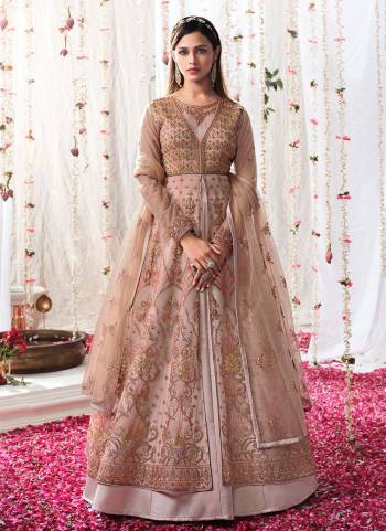 Grab These Semi Stiched Suit in Pretty Colored Pair With Bottom And Dupatta.These Top And Dupatta Are Fabricated On Butterfly Net Pair With Satin Bottom.Its Beautified With Heavy Designer Embroidery Work.