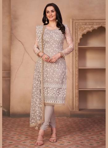 Grab These Semi Stiched Suit in All Over Beautiful Colored.These Top And Dupatta Are Fabricated On Mono Net Pair With American Crepe Bottom.Its Beautified With Designer Work.