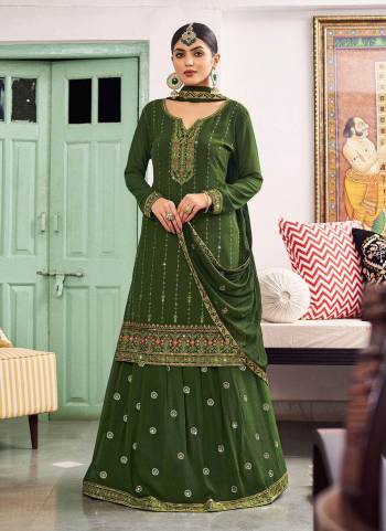 For A Different lookGfab These Lehenga Suit in All Over Beautiful Colored.These Top And Bottom Are Fabricated On Georgette Pair With Nazneen Dupatta.Its Beautified With Heavy Designer Embroidery Work.