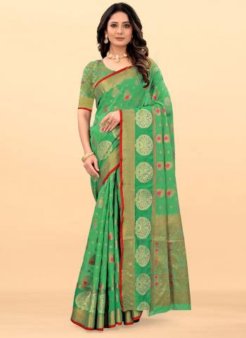 Enhance Your Beauty Wearing This Saree in Fine Colored Pair With Matching Blouse.These Saree And Blouse Are Fabricated On Cotton.Its Beautified Wiith Heavy Wevon Designer Work.