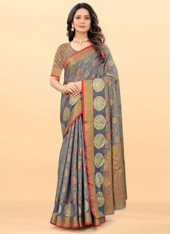 Enhance Your Beauty Wearing This Saree in Fine Colored Pair With Matching Blouse.These Saree And Blouse Are Fabricated On Cotton.Its Beautified Wiith Heavy Wevon Designer Work.