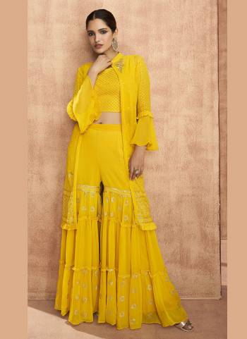 For A Designer Look,Grab These Sharara Suit in All Over Fine Colored These Top And Bottom Are Fabricated On Faux Georgette.Its Come With Heavy Designer Embroidery Work.