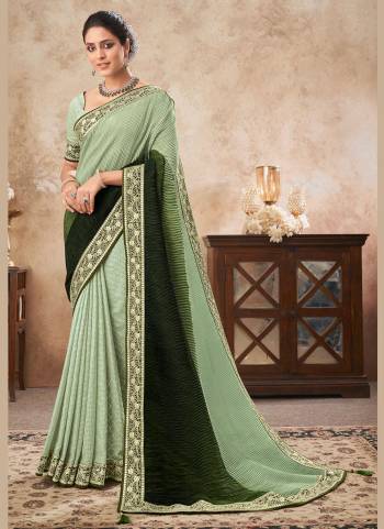 For A Different Look,Grab These Saree In All Over Fine Colored.These Saree is Fabricated On Chinon Crush Pair With Fancy Blouse.Its Beautified With Heavy Designer Work.