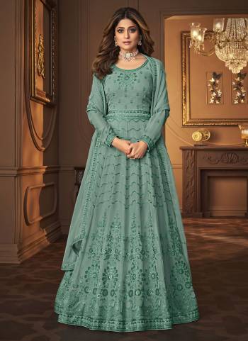 For A Designer Look,Grab These Designer Suit In All Over Fine Colored.These Top And Dupatta Are Fabricated On Georgette Pair With Silk Santoon Bottom.Its Beautified With Heavy Designer Work.