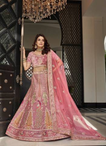 For A Designer Look,Grab These Heavy Designer Lehenga Choli in Fine Colored.These Lehenga And Blouse Are Fabricated On Velvet Pair With Soft Net Dupatta.Its Beautified With Heavy Designer Work.