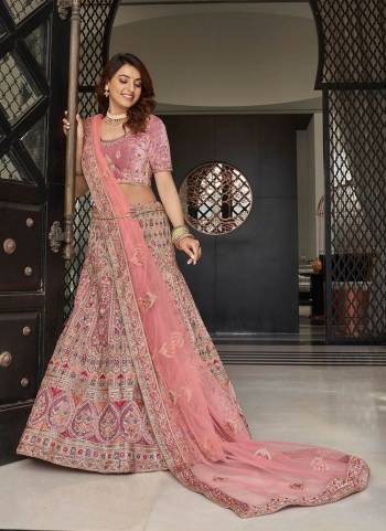 For A Designer Look,Grab These Heavy Designer Lehenga Choli in Fine Colored.These Lehenga And Blouse Are Fabricated On Velvet Pair With Soft Net Dupatta.Its Beautified With Heavy Designer Work.