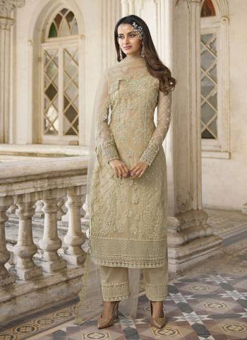 Grab These Designer Semi Stiched Suit in All Over Fine Colored.These Top And Dupatta Are Fabricated On Butterfly Net Pair With Satin Bottom.Its Beautified With Heavy Designer Embroidery Work.