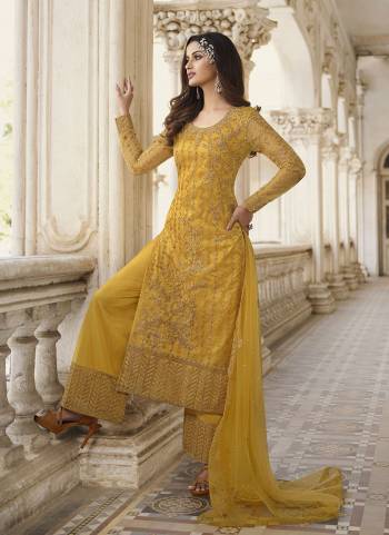 Grab These Designer Semi Stiched Suit in All Over Fine Colored.These Top And Dupatta Are Fabricated On Butterfly Net Pair With Satin Bottom.Its Beautified With Heavy Designer Embroidery Work.