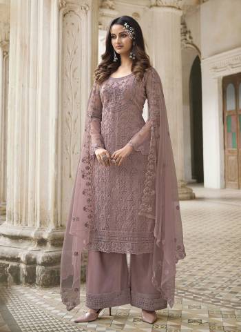 Grab These Designer Semi Stiched Suit in All Over Fine Colored.These Top And Dupatta Are Fabricated On Butterfly Net Pair With Satin Bottom.Its Beautified With Heavy Designer Embroidery Work.