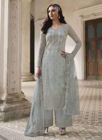 Grab These Designer Semi Stiched Suit in All Over Fine Colored.These Top And Dupatta Are Fabricated On Butterfly Net Pair With Satin Bottom.Its Beautified With Heavy Designer Embroidery Work.