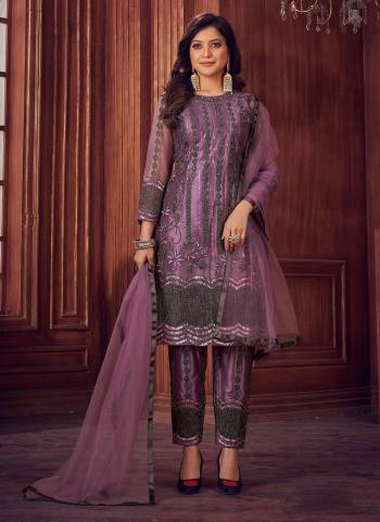 Garb These Beautiful Suit in All Over Fine Colored.These Top And Dupatta Come With Net Fabric Pair With Devsena Satin Bottom.Its Beautified With Designer Work.