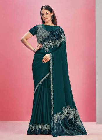 Here Is An Attractive Looking Beautiful Colored Saree.These Saree is Fabricated On Silk Georgette Pair With Raw Silk & Net Blouse.Its Beautified With Designer Work.