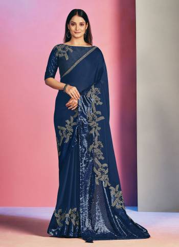 Here Is An Attractive Looking Beautiful Colored Saree.These Saree is Fabricated On Satin Silk Pair With Raw silk Blouse.Its Beautified With Designer Work.