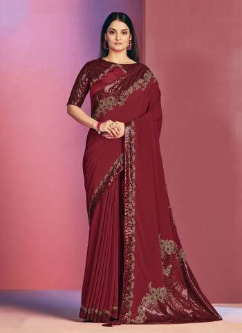 Here Is An Attractive Looking Beautiful Colored Saree.These Saree is Fabricated On Satin Silk Pair With Raw silk Blouse.Its Beautified With Designer Work.