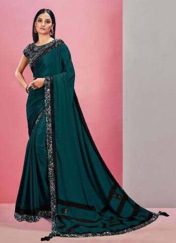 Here Is An Attractive Looking Beautiful Colored Saree.These Saree is Fabricated On Dual tone Silk Georgette Pair With Net Blouse.Its Beautified With Designer Work.