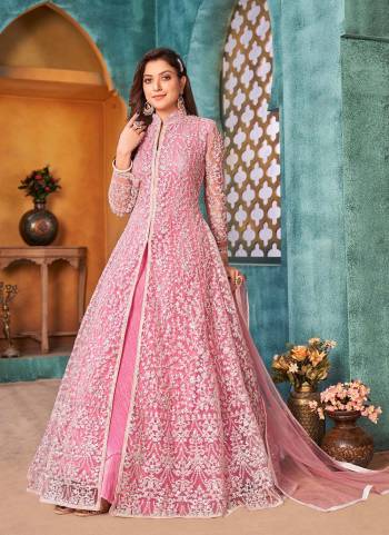 Here Is An Attractive Looking Beautiful Colored Suit.These Suit And Dupatta is Fabricated On Net Pair With Santoon Bottom.Its Beautified With Cording,Sequance Embroidery Work. 