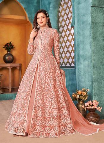 Here Is An Attractive Looking Beautiful Colored Suit.These Suit And Dupatta is Fabricated On Net Pair With Santoon Bottom.Its Beautified With Cording,Sequance Embroidery Work. 