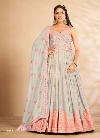 For A Different Look,Grab These Readymade Gown in Fine Colored.These Gown And Dupatta Are Fabricated On Georgette.Its Beautified With Designer Work.