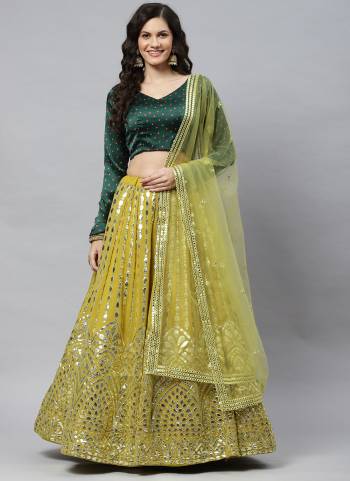 Grab These Beautiful Colored Lehenga Choli Come With Fancy Pattern.These Lehenga And Blouse Are Fabricated On Georgette Pair With Net Dupatta.Its Beautified With Heavy Designer Work.