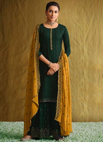 For A Different Look,Grab These Sharara Suit in All Over Fine Colored.These Top And Bottom Are Fabricated On Chinon Pair WIth Chinon Dupatta.Its Beautified With Heavy Designer Embroidery Work.