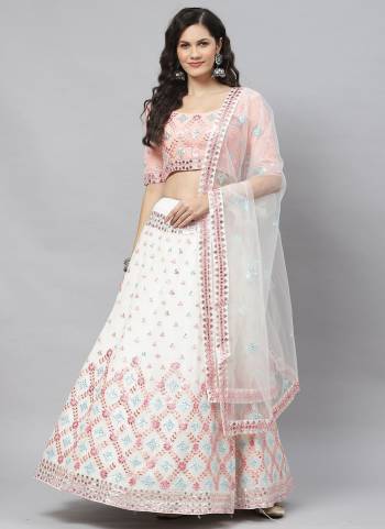 For A Designer Look,Grab These Designer Lehenga in All Over Fine Colored.These Lehenga And Blouse Are Fabricated On Georgette Pair With Net Dupatta.Its Beautified With Thread,Sequance Embroidery Work.