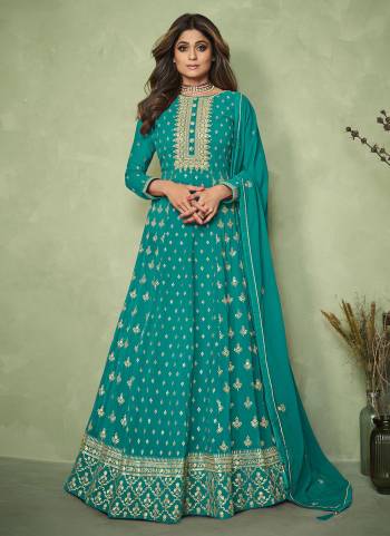 For A Designer Look,Grab These Suit in Fine Colored.These Top And Dupatta Are Fabricated On Georgette Pair With Dull Santoon Bottom.Its Beautified With Heavy Jari Embroidery Work.