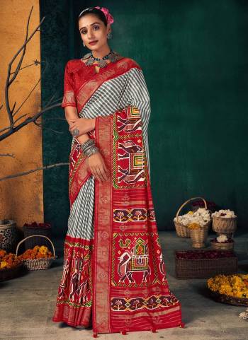 Grab These Saree In Beautiful Colored.These Saree And Blouse Are Fabricated On Dola Silk.Its Beautified With Designer Printed,Swarovski Work.