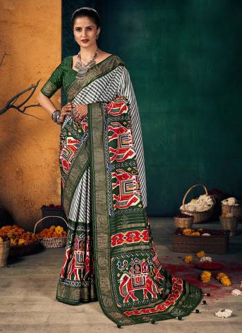 Grab These Saree In Beautiful Colored.These Saree And Blouse Are Fabricated On Dola Silk.Its Beautified With Designer Printed,Swarovski Work.