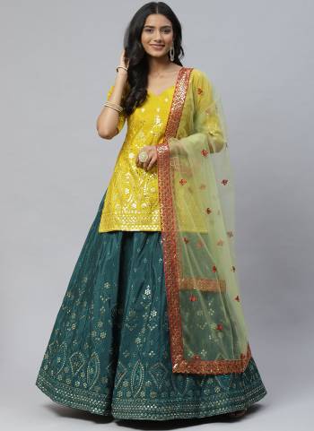 For A Designer Look,Grab These Lehenga Choli in All Over Fine Colored.These Lehenga And Blouse Are Fabricated on Chinon Pair With Net Dupatta.Its Beautified With Gotta Patti,Thread,Sequance Embroidery Work.