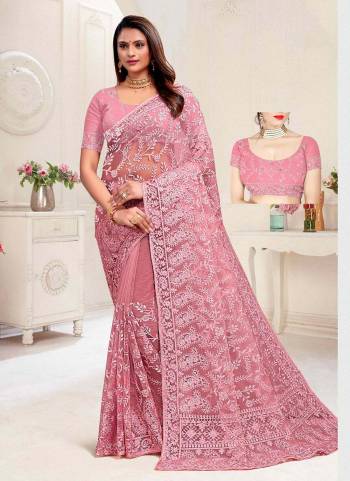 For A Different Look,Grab These Beautiful Colored Saree.These Saree And Blouse Are Fabricated On Net.Its Beautified With Heavy Designer Embroidery And Stone Work.