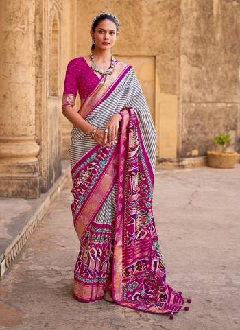 Buy These Beautiful Colored Saree pair With Blouse.These Saree And Blouse Are Fabricated On Patola Silk.Its Beautified With Weaving  Designer, Printed,Swarovski Work.