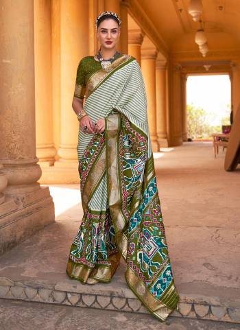 Buy These Beautiful Colored Saree pair With Blouse.These Saree And Blouse Are Fabricated On Patola Silk.Its Beautified With Weaving  Designer, Printed,Swarovski Work.