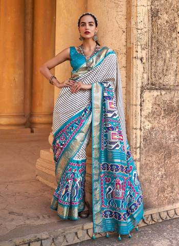 Buy These Beautiful Colored Saree pair With Blouse.These Saree And Blouse Are Fabricated On Patola Silk.Its Beautified With Weaving  Designer, Printed,Swarovski Work.